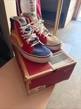 Vans women’s Multicolor High-Top Sneakers in Red, Blue, Yellow & White